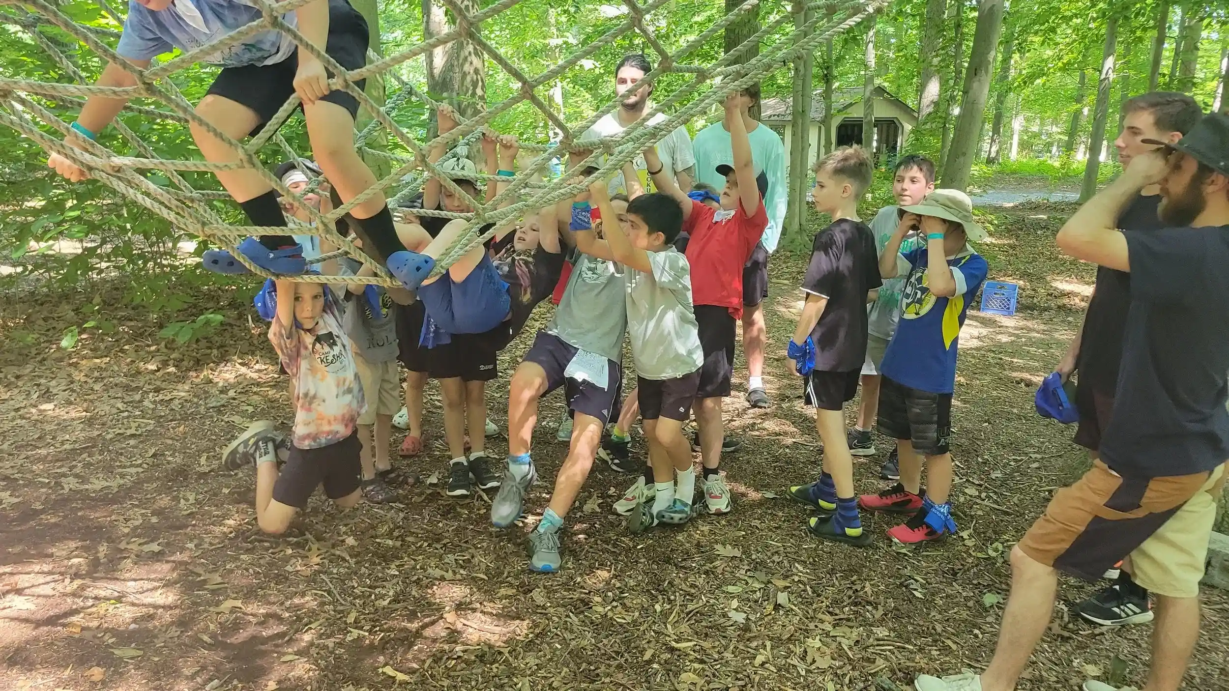 Tel Hai youth retreat experiencing a ropes course.